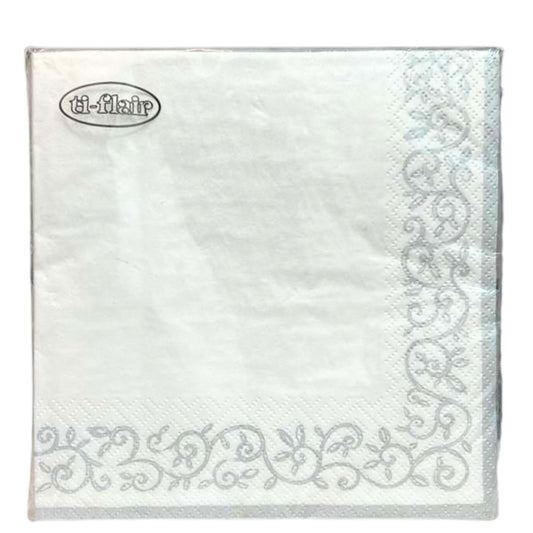 White napkin with decorative border and 'ti-flair' logo on a white background