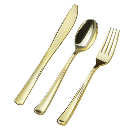Set of gold-plated cutlery including a knife, spoon, and fork on a white background