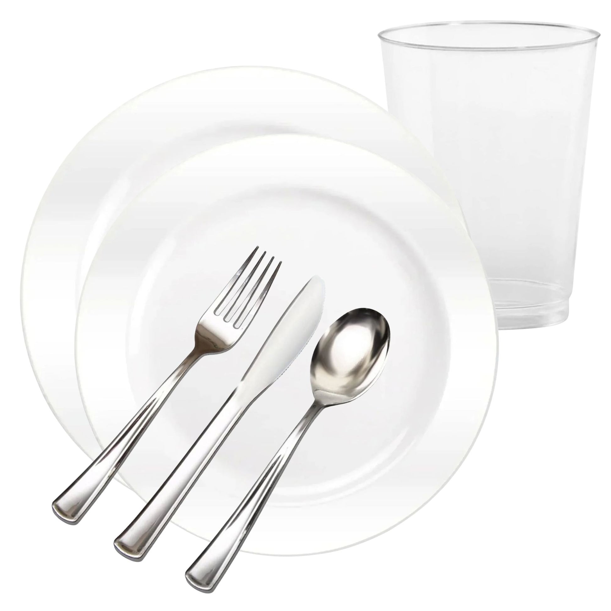 Clear glass, plates, fork, knife, and spoon on a white background