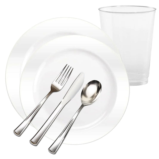 Clear glass, plates, fork, knife, and spoon on a white background