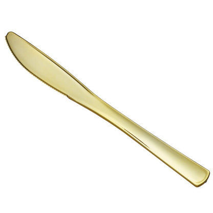 Gold knife on a white background