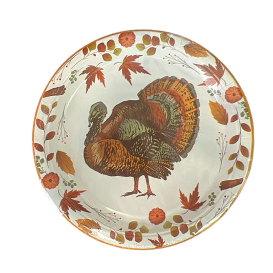 Decorative plate with a turkey and autumn leaves design on a white background